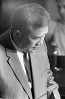 "Huong." Trần Văn Hương looking down at notes.