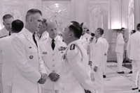 Nguyá»…n KhÃ¡nh at a formal meeting.