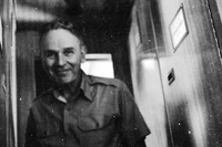 Maxwell D. Taylor smiles at the camera.