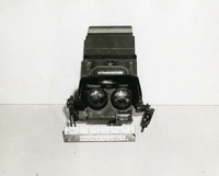 "During the week of 28 Apr., U.S. Forces fighting in the A Shau valley have captured various Soviet-built weapons and components from the North Vietnamese. The sophistication of these captured and the increase in fire power that they represent pose a definite increase in the threat to allied forces. In addition, the recovery of the these items reflect the continued support of North Vietnam by the Soviet Union. Soviet Infrared Periscopes from PT-76 Tank. This device allows the tank to operate and fire its armament during hours of the darkness with ease. The photograph shows the eyepiece on the periscope." A periscope.