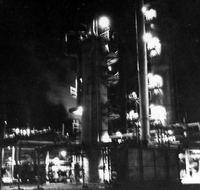 "Korea-Negs 181-3(1)-182-3(1) Chungyu Fetilizer Plant- USAID 10" Exterior of a factory at night. From scrapbook page 23.