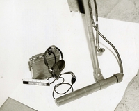 "During the week of 28 Apr., U.S. Forces fighting in the A Shau valley have captured various Soviet-built weapons and components from the North Vietnamese. The sophistication of these captured weapons and the firepower that they represent pose a definite increase in the threat to allied forces. In addition, the recovery of these items reflects the continued support of North Vietnam by the Soviet Union. Soviet transistorized mine detector. This detector is a newly developed portable, lightweight instrument with transistorized circuitry. It uses standard 'D' type dry cell batteries as a power source and is more efficient than the Chinese copies previously captured from the enemy. The photograph shows component parts o the detector." A mine detector and headphones.