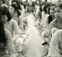 People in attendance of a press conference.
