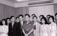 Nguyá»…n KhÃ¡nh at a formal meeting.