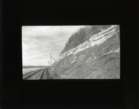 Original caption: XXIV-6 NAB. Apr. 14, 1912. Two lower l.s. in scarp west of Oreapolis. Basal ledge is the lowest in Nebraska series. Cass County. (121111-00227)