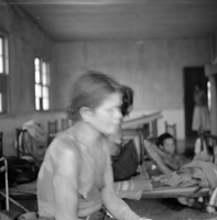 "KT Leprosy ", picture of an old individial, other elderly in the background
