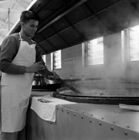 "Ai Lam - HK*" Man stirring some boiling liquid.