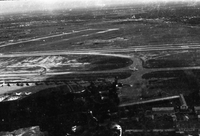 An aerial photograph of an air base and runway.