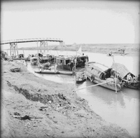 "Cao Lanh - M:VED Operation - etc." Several boats near the shoreline.