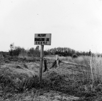 "Korea-Negs 182-3(2)-193-1(1) DMZ 1" A sign in the middle of a field with a barbed wire fence. The sign has english text ("Military Demarcation Line") and korean text. From scrapbook page 23.