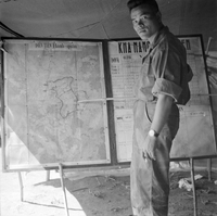 "40th Reg Tan Canh Gen Dinh VN Soldier Casket's photos", a soldie next to a map and a board full of information