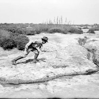 Original caption: FHS chasing tiger beetles, Salt Basin. Frank Shoemaker holding net