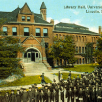 Postcard view of Library with graduates. View Image