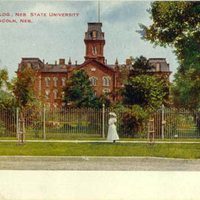 Postcard view with iron fence.