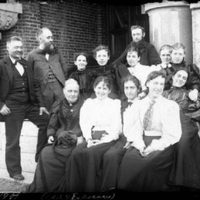 Professor Bessey (standing, second from left), Ellen Smith (seated, first on left, front) and students,  1895. View Image