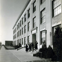 Coeds on the south steps of Andrews Hall, 1930s.